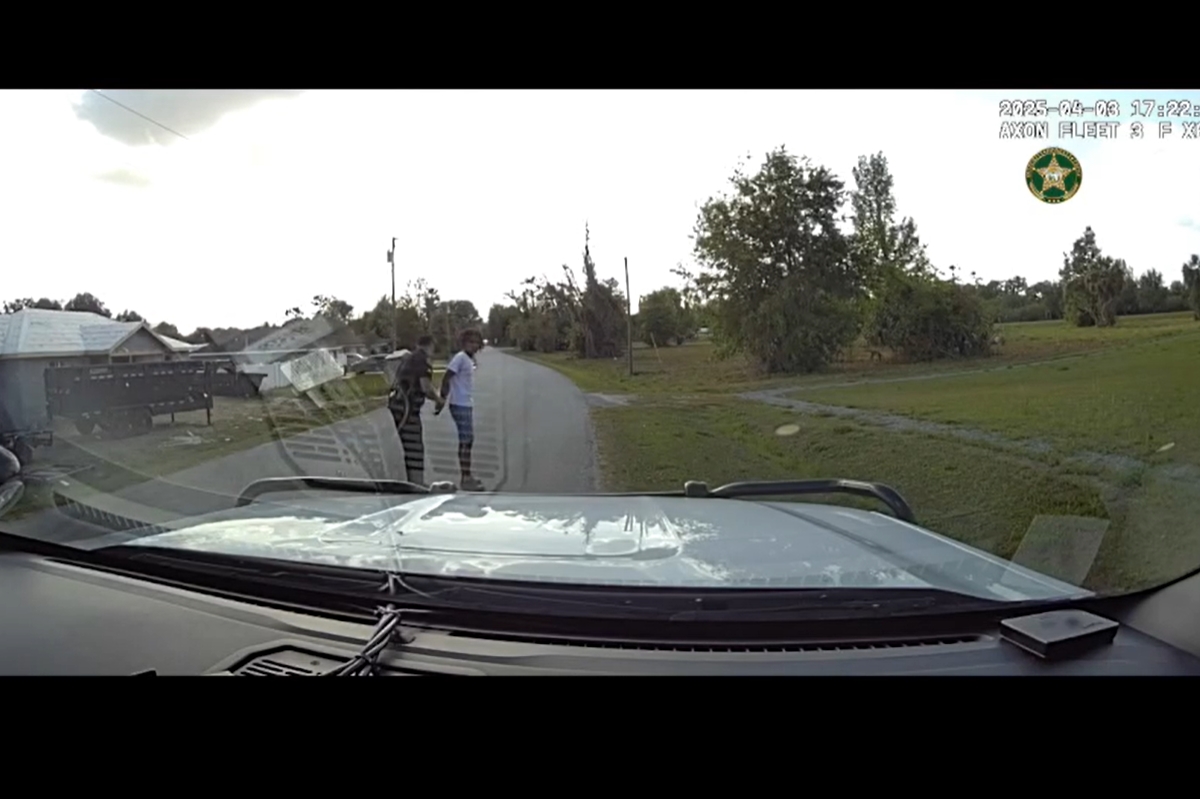 Deputy Young places Titan Kiner, 17, in handcuffs on April 3, 2025, in northwest Marion County, FL. Kiner was arrested after allegedly pointing a realistic-looking BB gun at children from a passing moped.