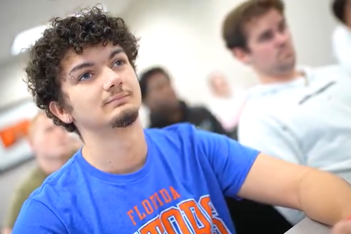 A College of Central Florida student wears a University of Florida T-shirt while attending in Ocala, Fla., reflecting the new “Going Gator” transfer partnership between CF and UF.