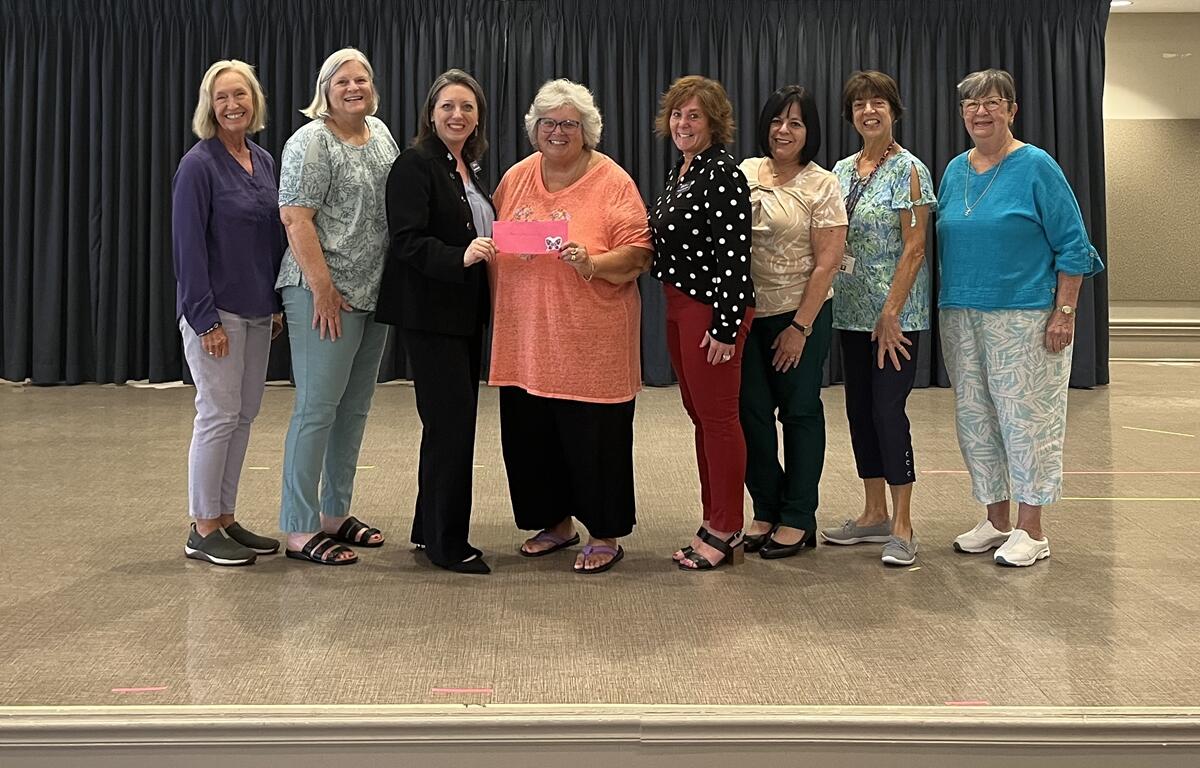 Left to right: Marcia Meloni, WOW 2nd VP; Patricia Pratt, WOW Technology Chairperson; Kari Hamende, HMCF Interim Executive Director; Michele Croud, WOW President; Stacey Perlmutter, HMCF Annual Gifts Manager; Martha Dominguez, HMCF Dementia Services Manager; Dolores Burke, WOW 1st VP; Anita Martinetto, WOW Treasurer.