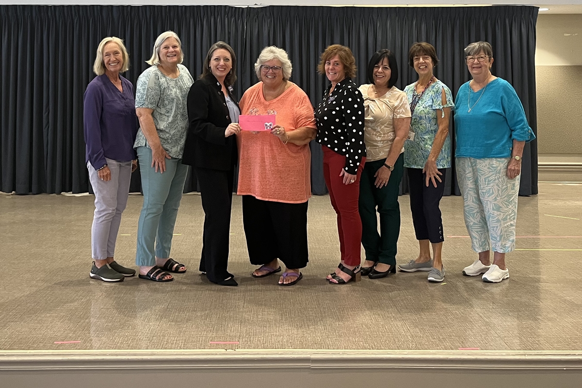 Left to right: Marcia Meloni, WOW 2nd VP; Patricia Pratt, WOW Technology Chairperson; Kari Hamende, HMCF Interim Executive Director; Michele Croud, WOW President; Stacey Perlmutter, HMCF Annual Gifts Manager; Martha Dominguez, HMCF Dementia Services Manager; Dolores Burke, WOW 1st VP; Anita Martinetto, WOW Treasurer.
