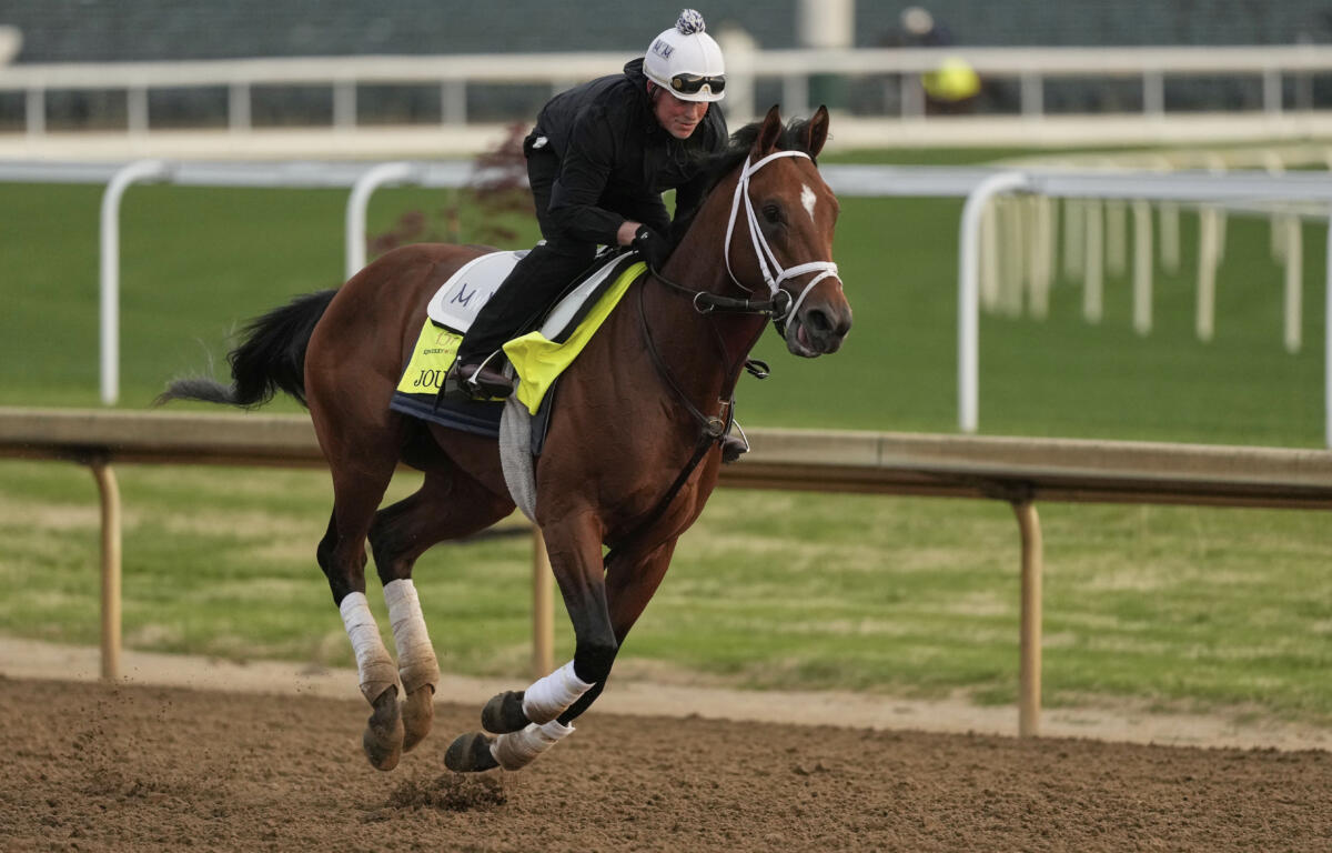 Photo of Kentucky Derby entrant Journalism working out at Churchill Downs 