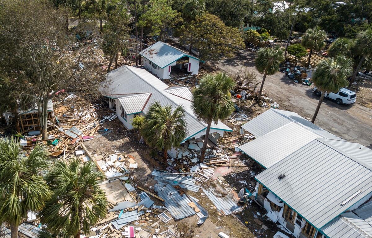 Aerial view of storm-ravaged homes and debris scattered across Cedar Key, Florida, after Hurricane Helene.
