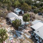 Aerial view of storm-ravaged homes and debris scattered across Cedar Key, Florida, after Hurricane Helene.