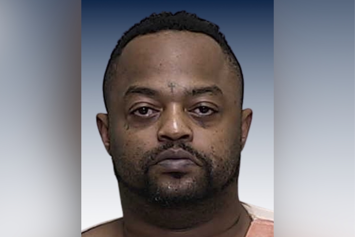 Mugshot of Stanley Summer Jr. wearing an orange prison uniform, facing forward with a neutral expression.