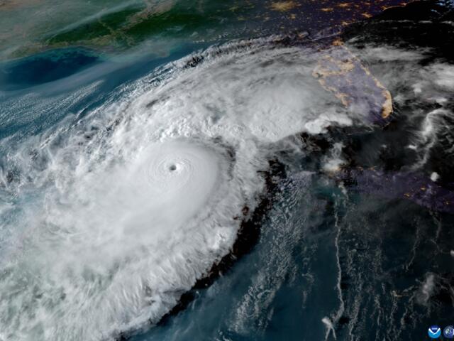 Image of Hurricane Milton from NOAA's GOES-16 satellite on Oct. 8, 2024, showing a well-defined eye and dense cloud bands approaching the Florida peninsula.
