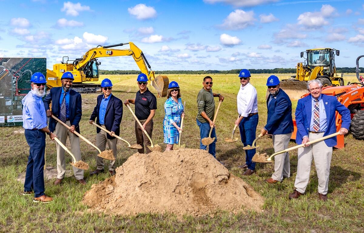 Group of officials with shovels at Marion County Airport X35 groundbreaking ceremony for new taxiway project.
