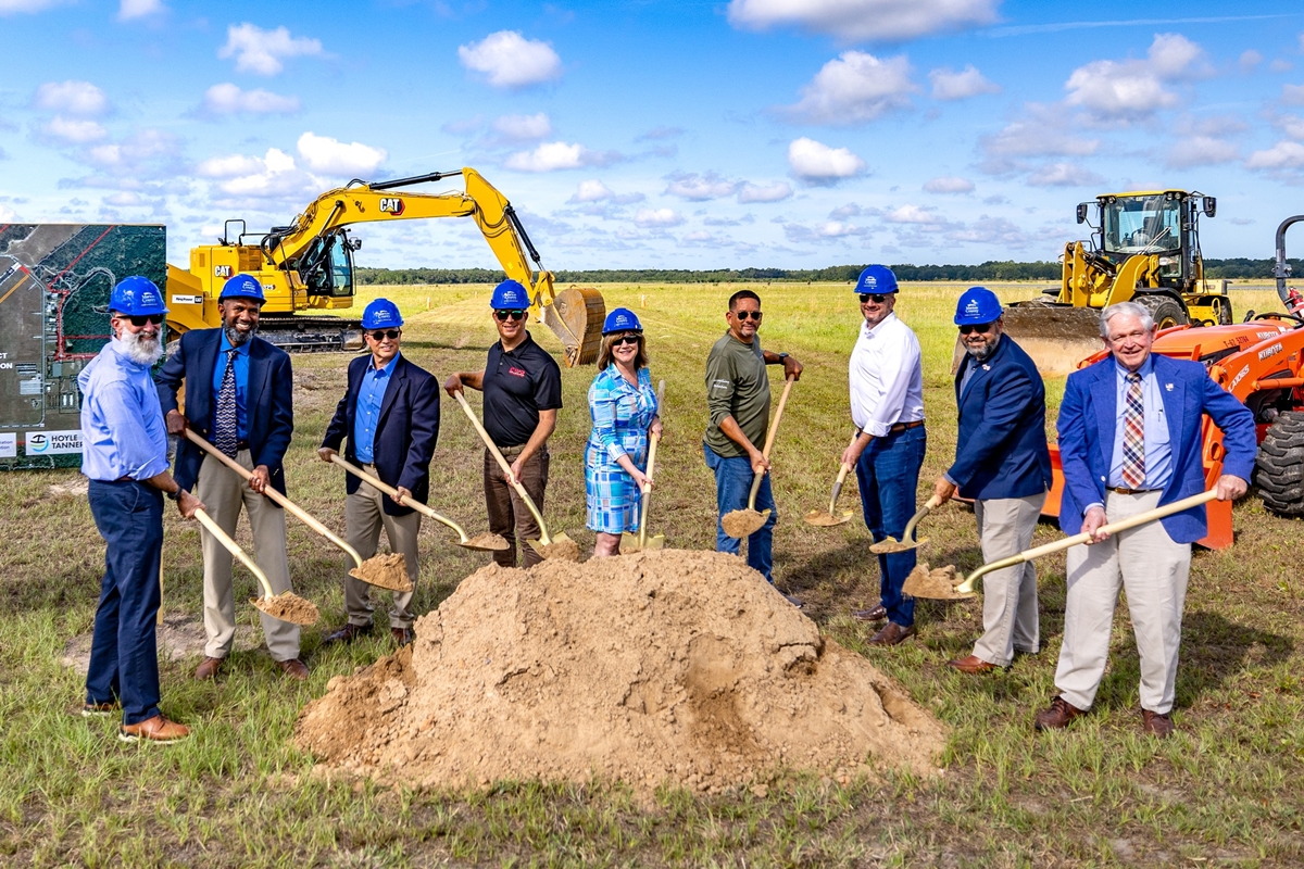 Group of officials with shovels at Marion County Airport X35 groundbreaking ceremony for new taxiway project.