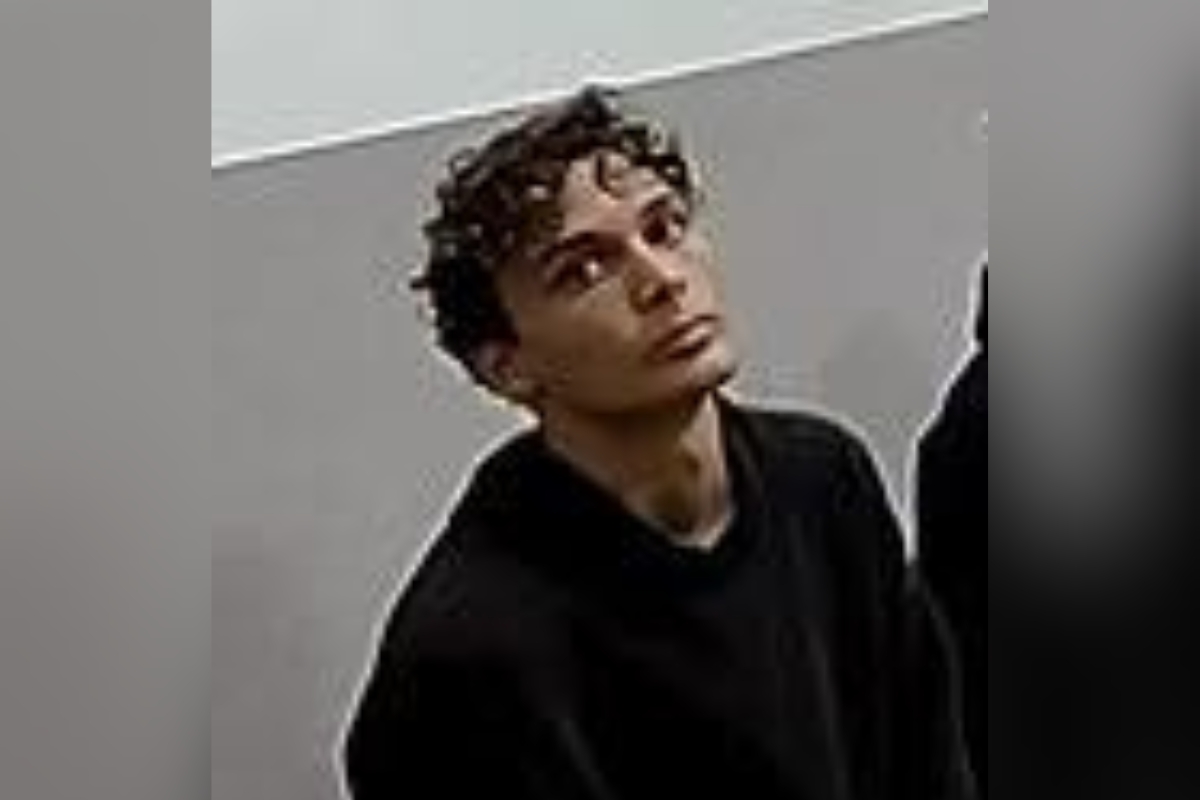 Missing teen Dante Sparrowhawk, 15, wearing a black hoodie, looking upward in a security camera image released by Ocala Police.