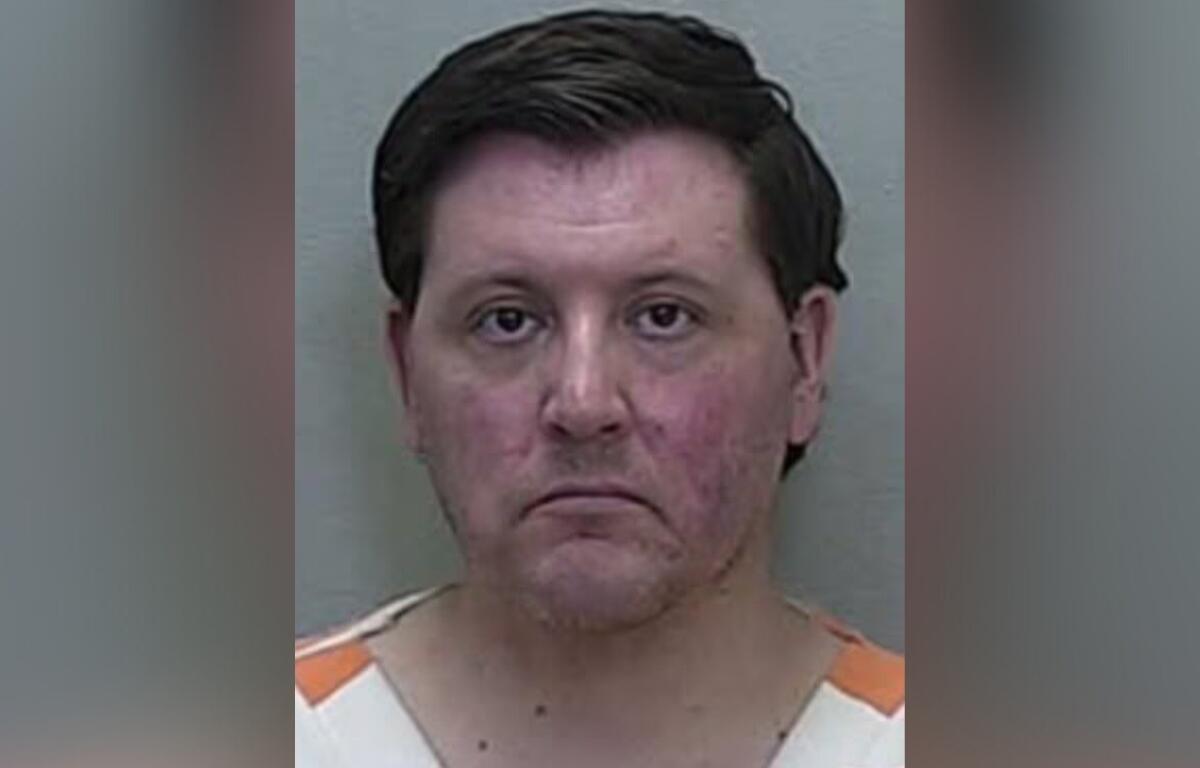 Mugshot of Dennis Grundy following his arrest for organized fraud and grand theft in Ocala.