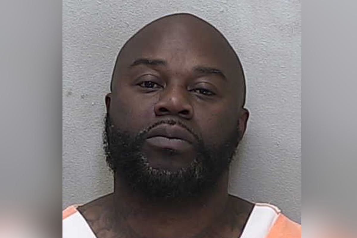 Mugshot of Harry Gregg following his arrest in Marion County, Florida, wearing a jail uniform.