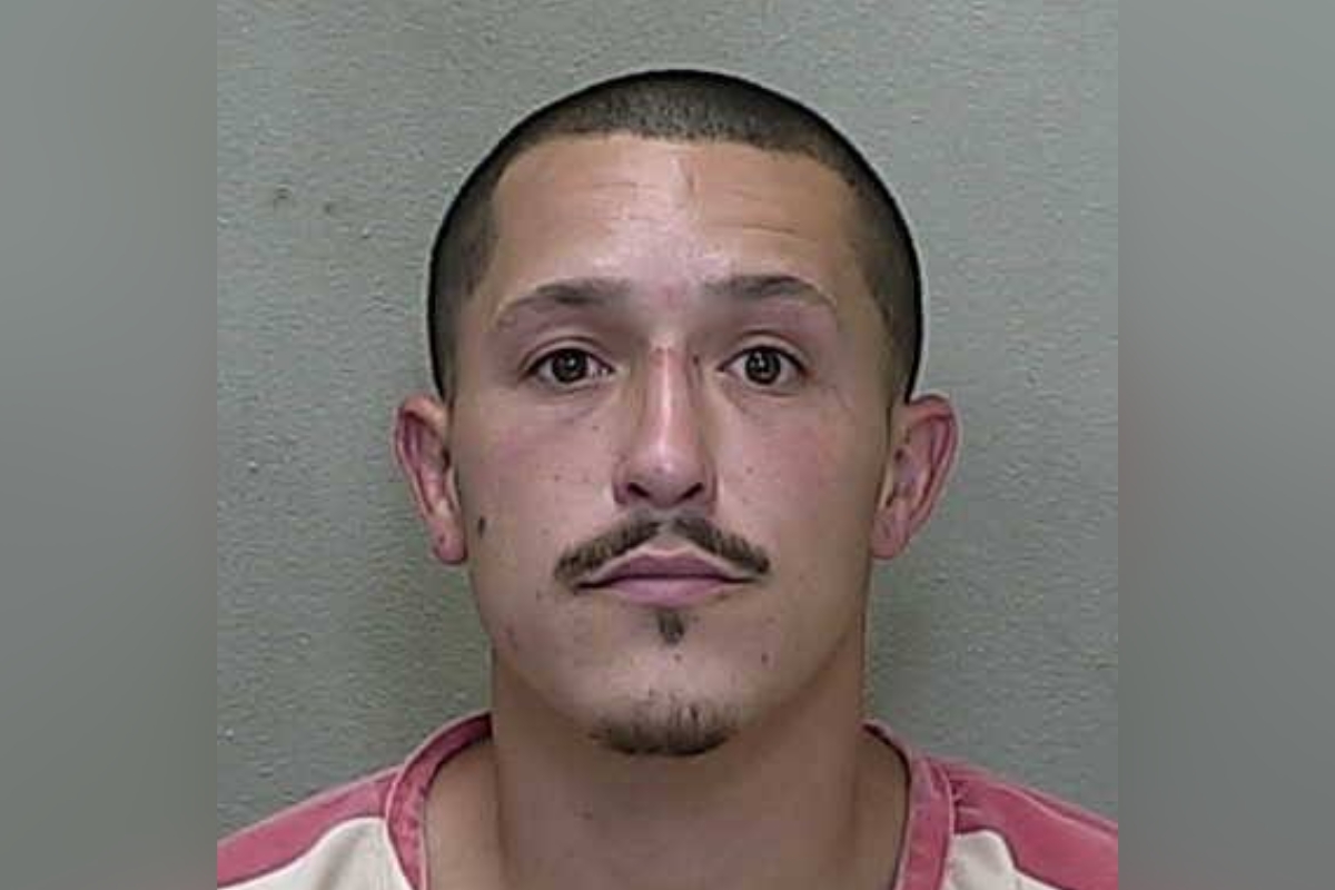Mugshot of Jarred Michael Hunsberger, 32, wearing a red and white jail uniform, taken by the Marion County Sheriff’s Office.