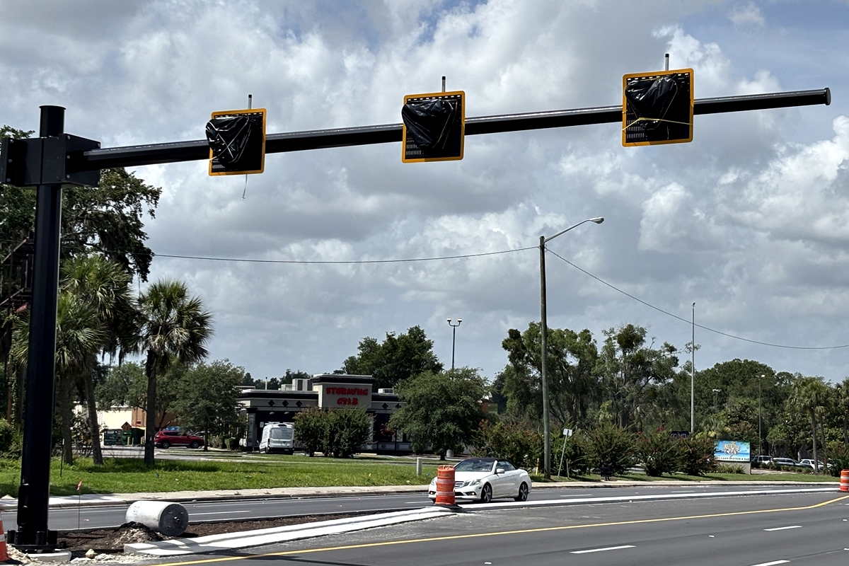 Covered pedestrian hybrid beacon signal installed over State Road 200 near Ocean Buffet in Ocala.