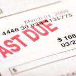 Close-up of a utility bill marked "PAST DUE" with an amount of $168.50 and due date of 03/21/23.