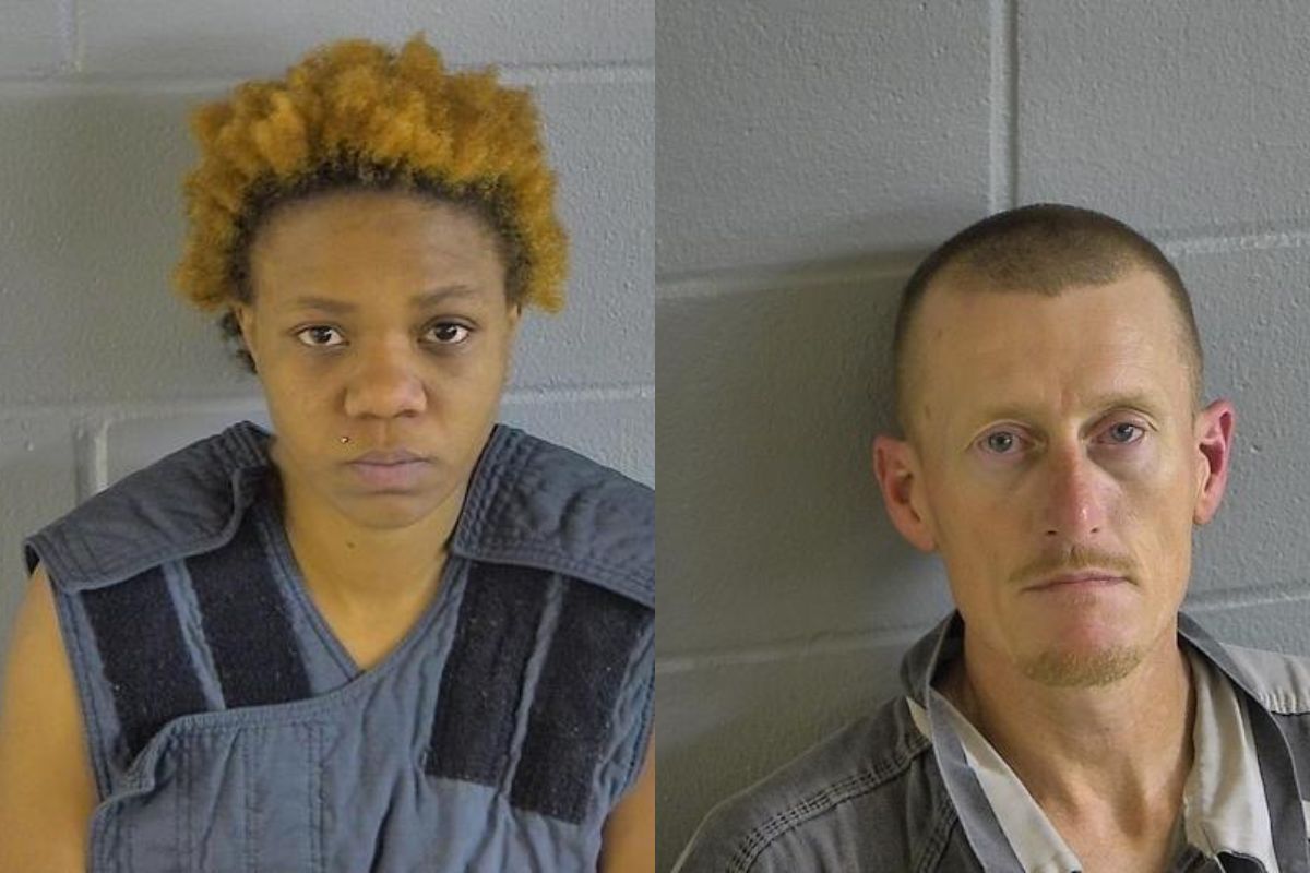 Person on the left is Chiane Carter, with orange-dyed hair and a blue shirt. The person on the right is Clifton Spivey, bald head wearing a grey shirt
