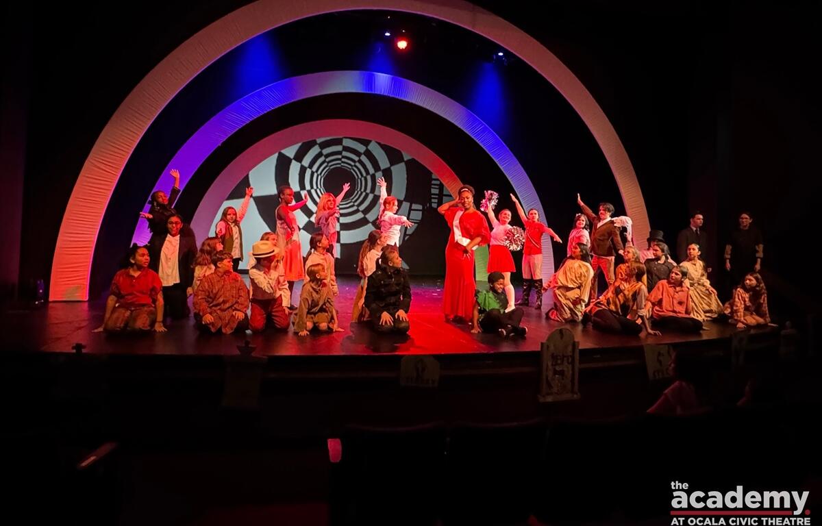 Youth cast performs on stage during Beetlejuice Jr. dress rehearsal at Ocala Civic Theatre.
