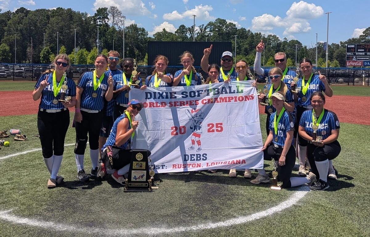 The Belleview 19u Dixie Debs softball team poses with their championship banner and trophies after winning the 2025 Dixie Softball World Series.