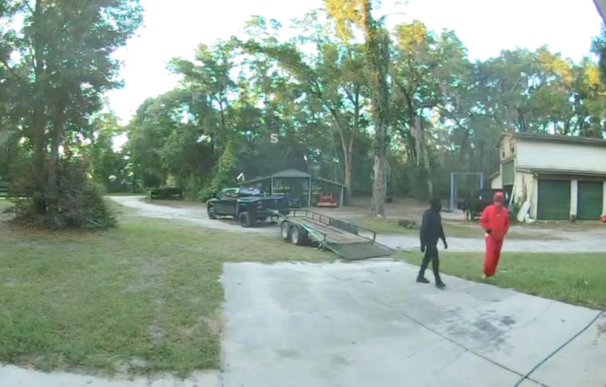 Surveillance image of two suspects during a home burglary in Citra, Florida