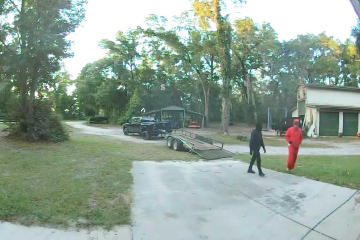 Surveillance image of two suspects during a home burglary in Citra, Florida
