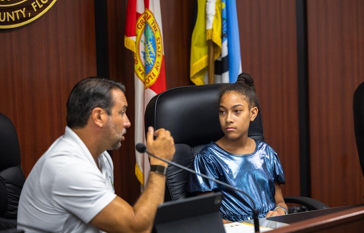 Mayor Ben Marciano speaks with Isabella Fipps during her day as Ocala’s honorary mayor on July 28, 2025.