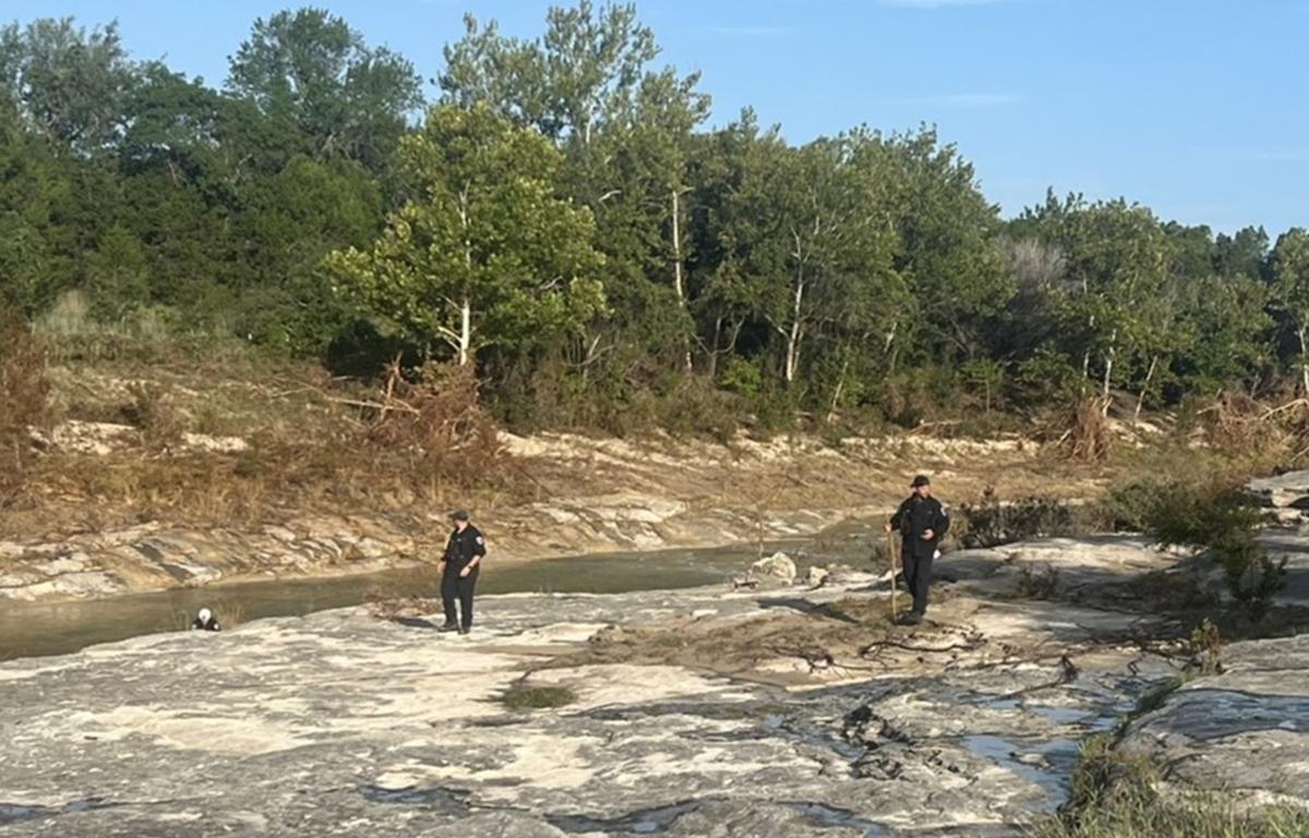 Task Force 8 team members search along rocky creek in Texas during flood response