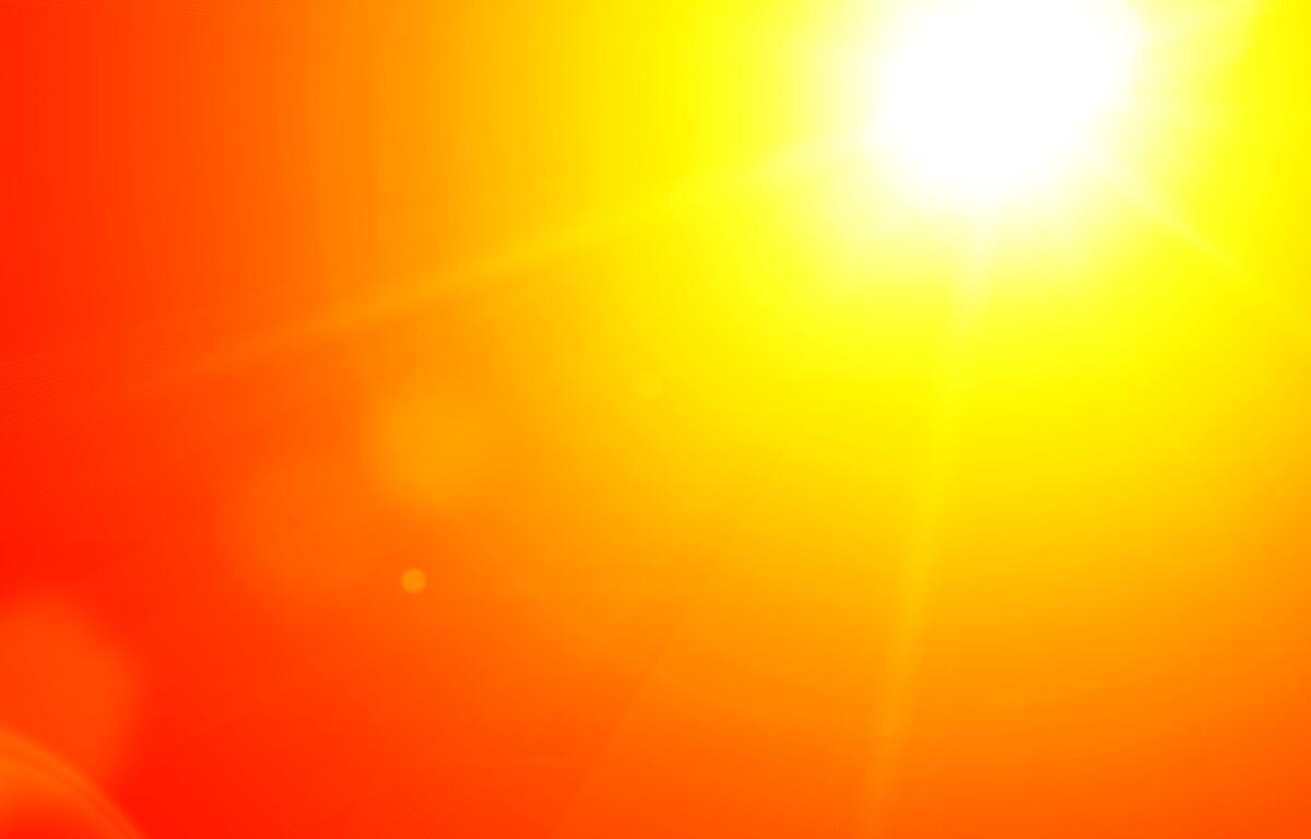 Bright sun with intense yellow and orange heat glow representing high temperatures.