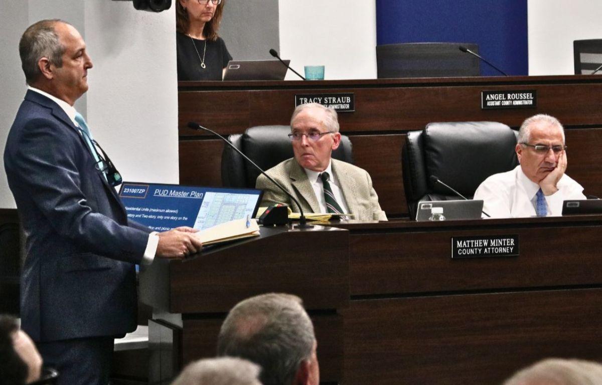 Paolo Mastroserio presents development plans to Marion County commissioners during a public meeting.