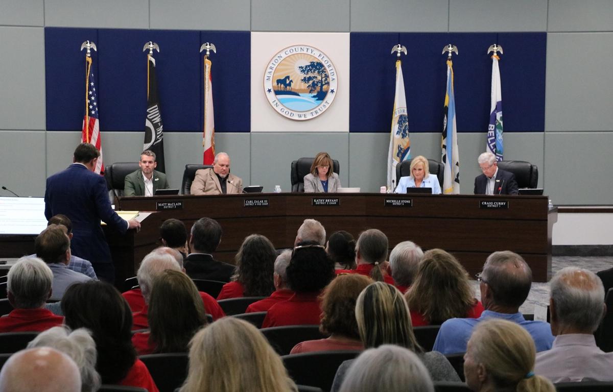Marion County commissioners and audience during a public hearing.
