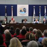 Marion County commissioners and audience during a public hearing.