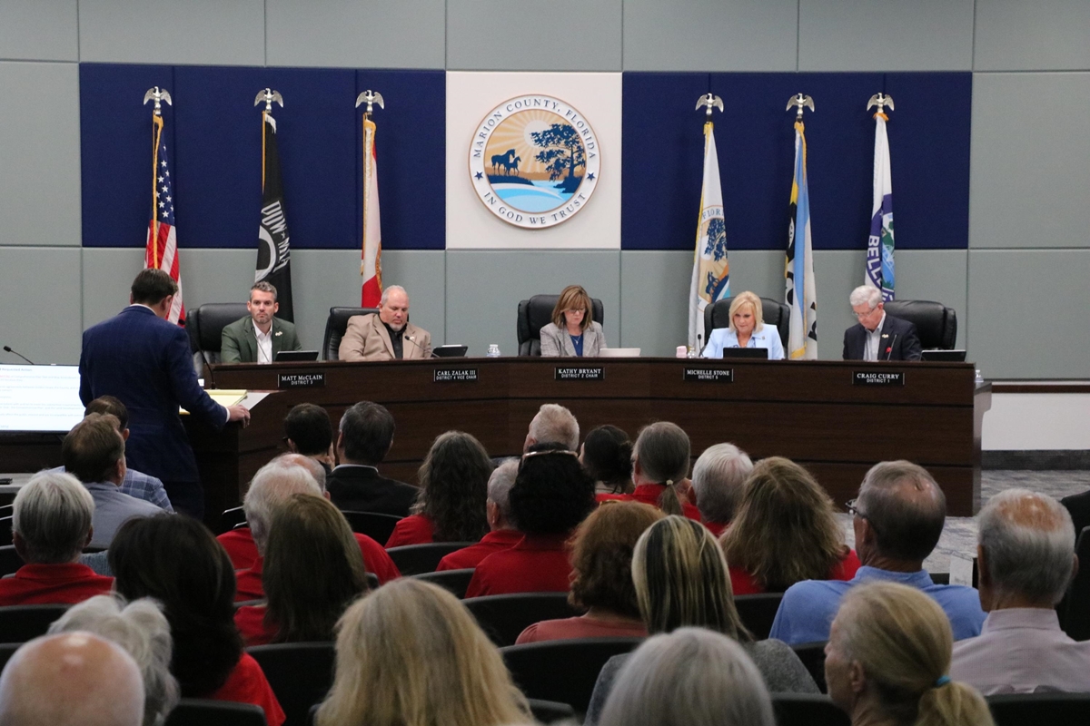 Marion County commissioners and audience during a public hearing.