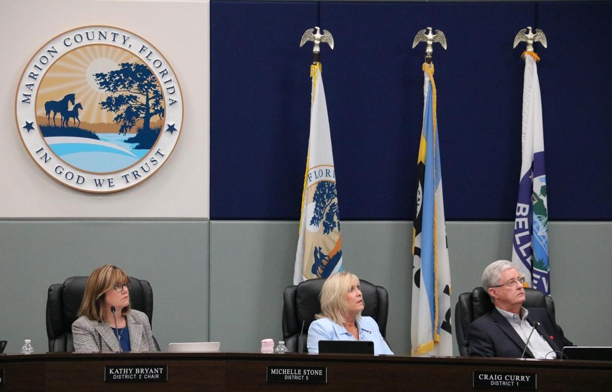 Marion County commissioners seated at the dais during a hearing.