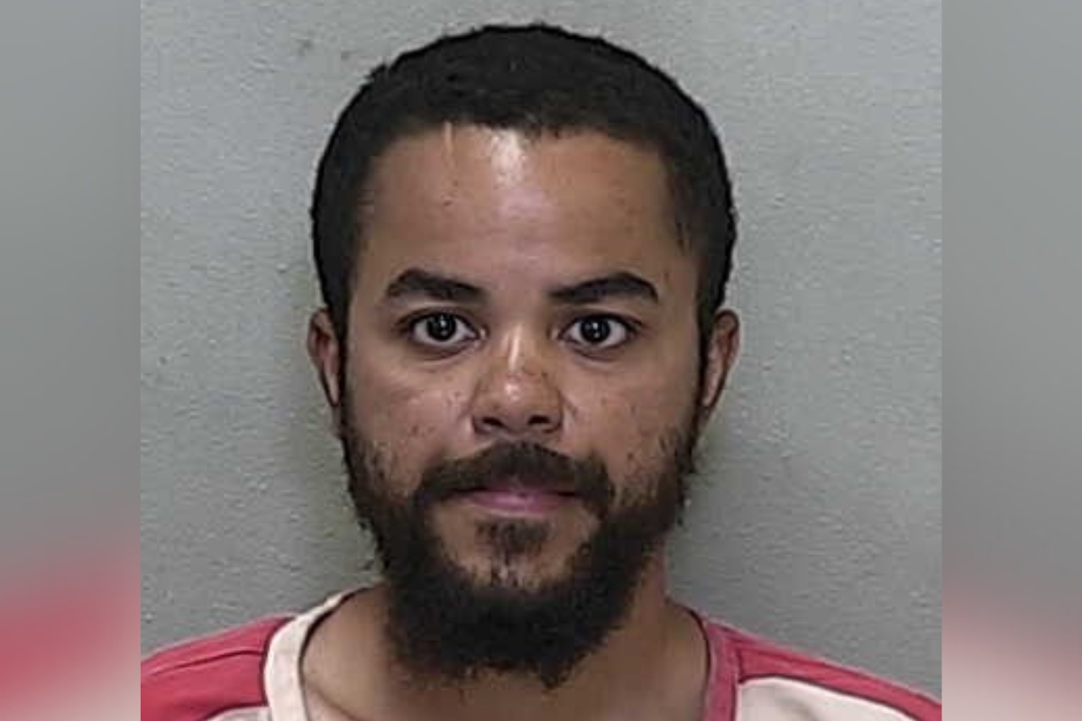 Mugshot of Za’Mond Shanard Smith, a 25-year-old man with a beard, wearing a red and white jail uniform, arrested on July 1, 2025.