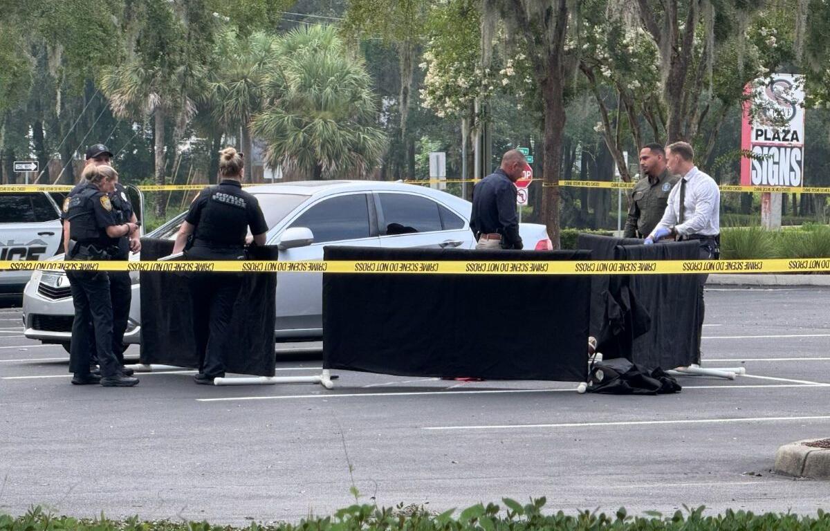 Police Investigating a body found at 1st Ave National bank in Ocala