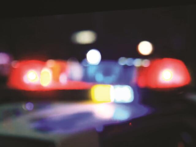 Colored image of blurred cop car lights.