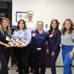 HCA Florida Ocala Hospital staff pose with cupcakes in celebration of stroke care award.