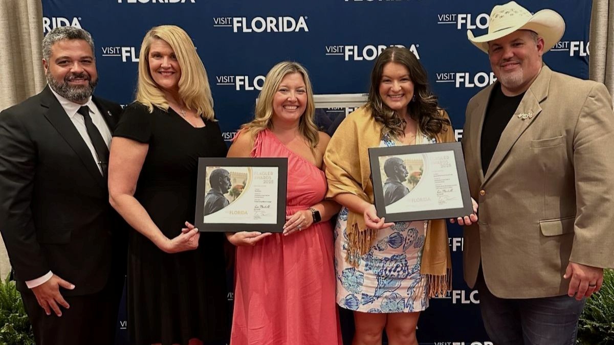 Angel Rousell, Assistant County Administrator for Marion County; Loretta Shaffer, Tourism Development Director for Marion County; Sky Wheeler, Tourism Development Manager for Marion County; Jessica Heller, Marketing and Communications Supervisor for Marion County Tourist Development; and Carl Zalak III, County Commissioner for Marion County, proudly showcase the two Flagler Awards won. 