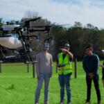 CF Agribusiness Management Program Manager, Tavis Douglass, (in safety vest) demonstrates a precision agriculture drone for CF staff