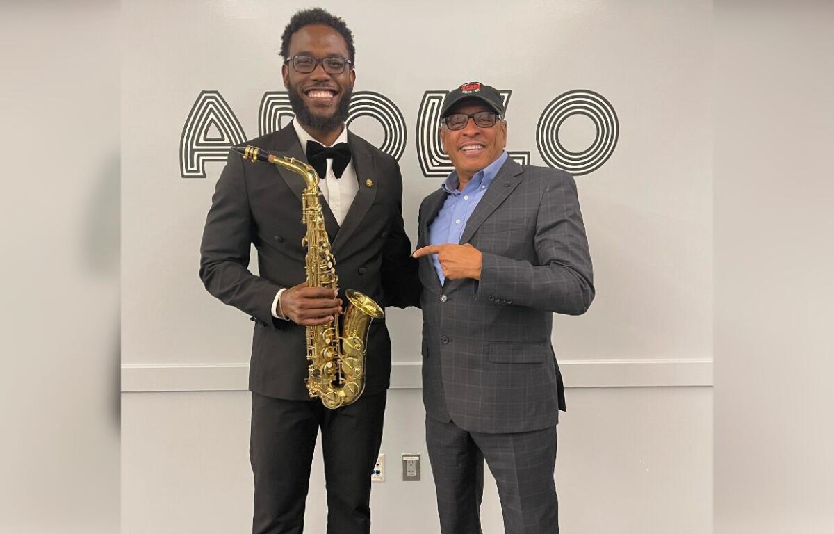 Director Marion J. Caffey and award-winning saxophonist Emmanuel Garilus, the co-grand marshals of the 2025 A Very GNV Holiday Parade.