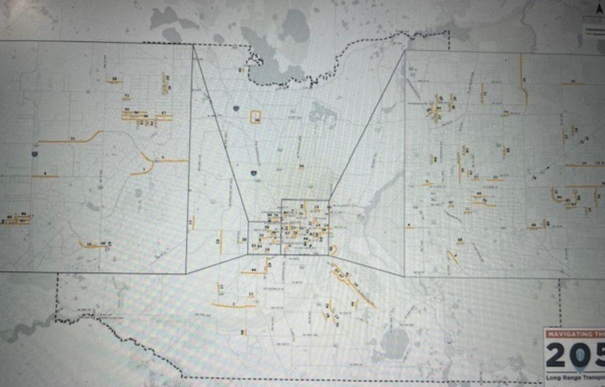 A large poster size map, featuring various lines, with names, legend and map key.