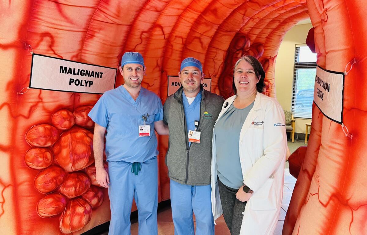 Dr. Jack Weckowski, center, is pictured with a resident physician from HCA Florida Ocala Hospital and Julie Bonnie, manager of the oncology nurse navigation team for HCA Healthcare’s North Florida Division.