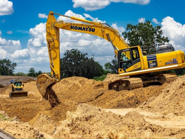Construction crews excavate land along the route of the new SW 40th and 49th Ave project in July 2025.