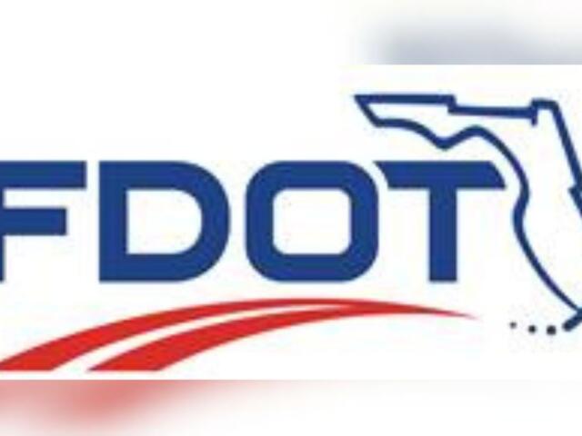 White background, blue lettering, outline of the State of Florida, and in the foreground and orange image to symbolize a road.