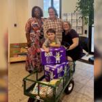 Lucas donation w-CEO: Early Learning Coalition of Marion County CEO LaTrisha Sims, Tayler Croom-Perez (Lucas’s mom), Parent Education Coordinator Ruth Velez, and Lucas Perez with the donations Lucas bought to help babies