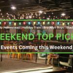 A bar has a few people around it with fairy lights hanging above, shops in the background and tables scattered around the area. In the background are trees and powerlines. In the foreground is a graphic that reads, "Light-Up Homestead | Holiday Train | Brooklyn Boys | Black Dress. WEEKEND TOP PICKS. Events Coming this Weekend." Christmas lights hang from the top of the graphic with a woman in a black dress on the right and a small train on the left.