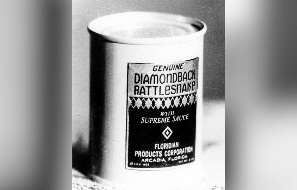 A black-and-white photograph of canned rattlesnake meat.