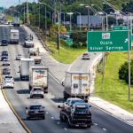 Commuters on I-75 drive past Ocala's Exit 350 in 2023