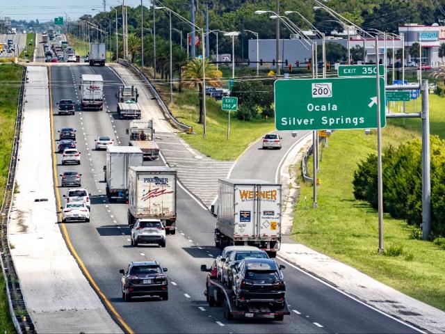 Commuters on I-75 drive past Ocala's Exit 350 in 2023