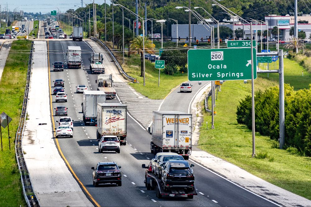Commuters on I-75 drive past Ocala's Exit 350 in 2023