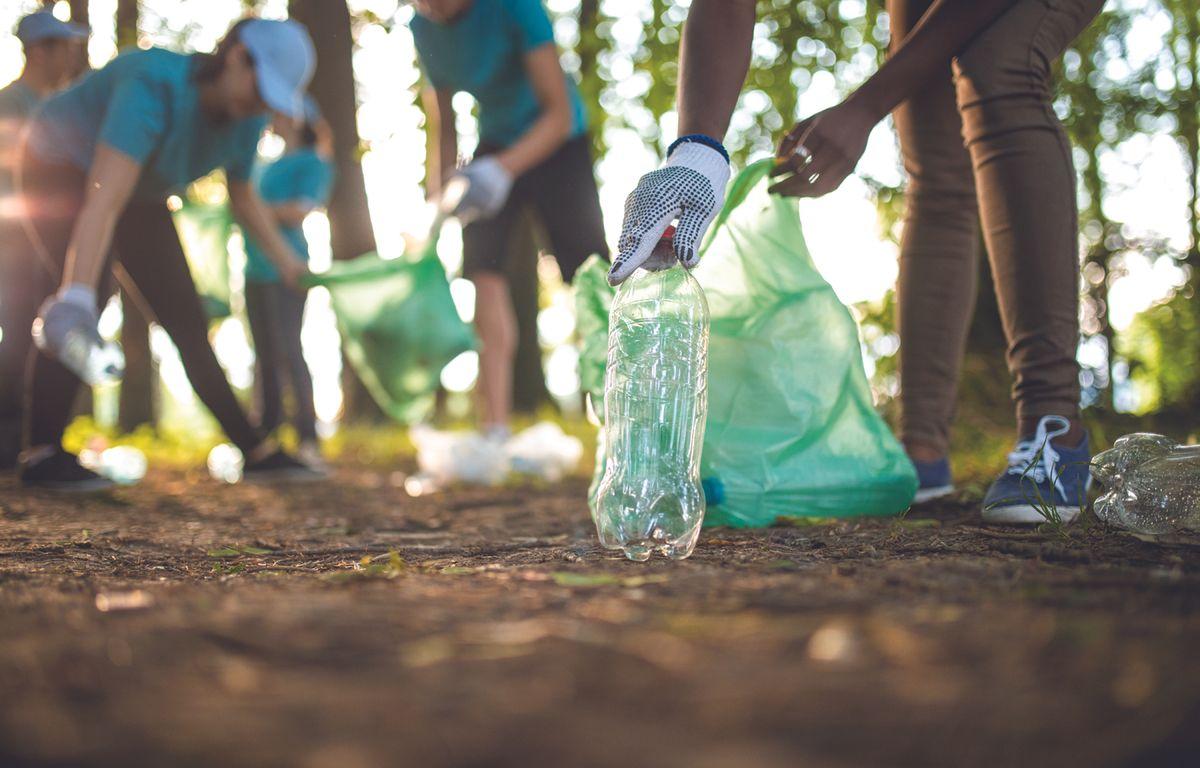 volunteers clean up waste