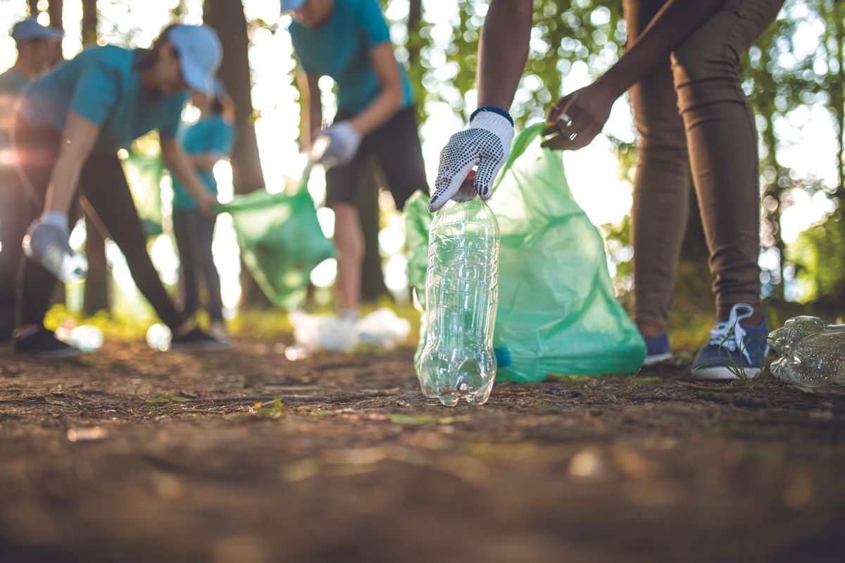 volunteers clean up waste