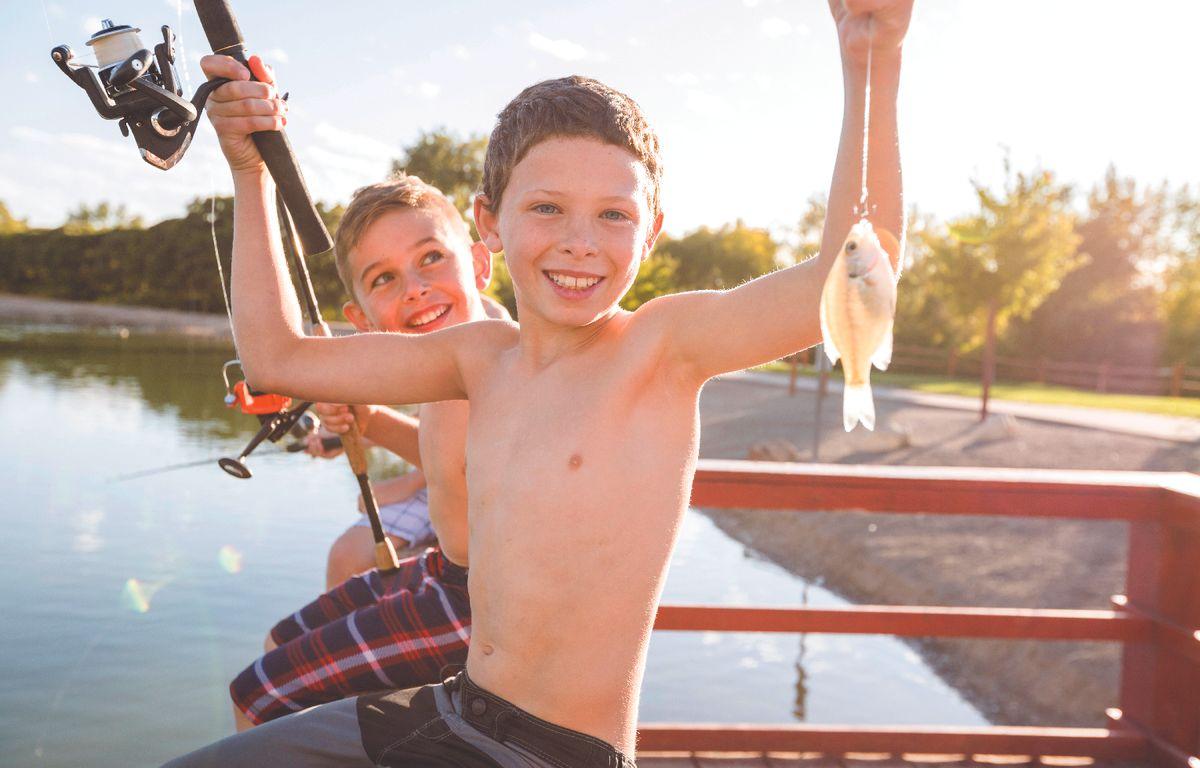 fishing kids catch a small panfish